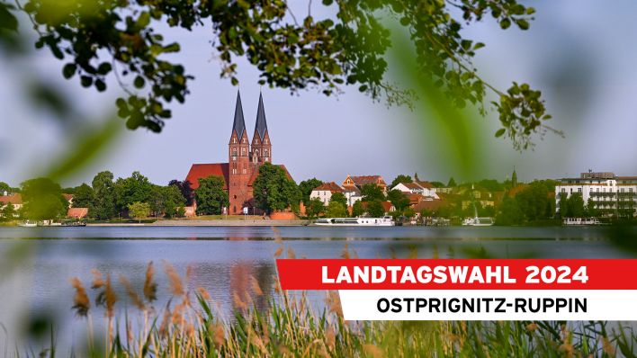 Symbolbild: Die Türme der Klosterkirche St. Trinitatis sind am Ufer des Ruppiner Sees. (Quelle: dpa/Jens Kalaene)